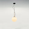 Modern dimmable LED suspension light NH 35 by Artemide with white glass and brass ring for living room décor