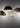 Modern pendant light with satin nickel hardware and glossy white dome for upscale interiors