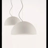 Oluce Sonora 411 opaline glass dome pendant light in a dining room