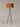 Designer tripod floor lamp with warm red amber shade