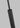 Modern dark bronze Ebell pendant, warm LED, living room.