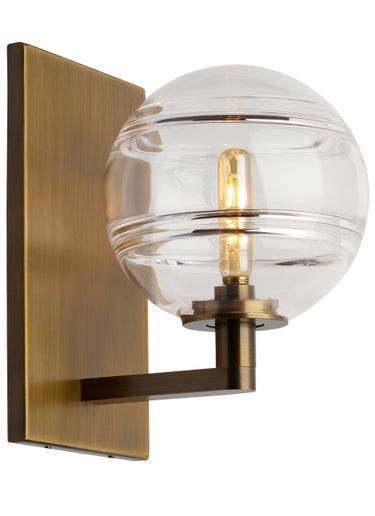 Modern LED Sedona wall light fixture with clear glass globe and antique brass finish for upscale interiors