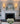 Emily rechargeable wall sconces in antique brass on each side of a fireplace mirror