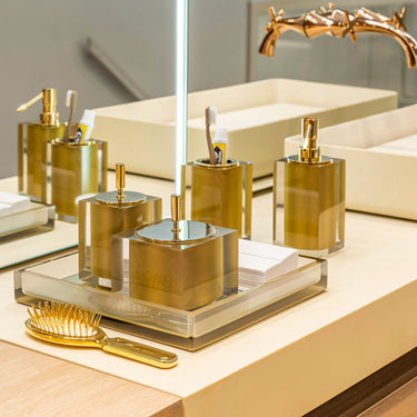 Gloss Gold Toothbrush Holder by Vallvé, in a styled bathroom