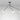 Array Mini pendant in bronze with three opal glass globes on rotating arms, studio view