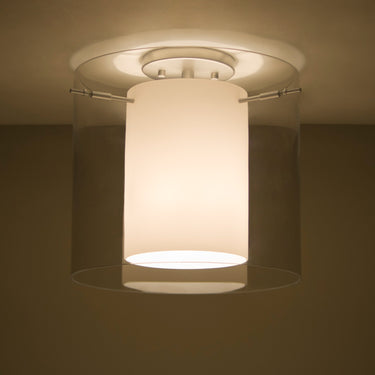 Pahu 12 semi-flush in Clear/Opal glass, glowing | Besa Lighting