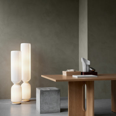 Lit beside a sofa | TR41 Floor Lamp by Tom Rossau