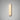 Hepworth wall light in satin brass with a rounded honed alabaster panel, lit on a grey wall
