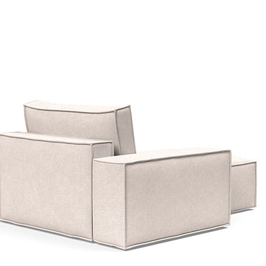 Innovation Living Newilla lounger chair with soft spring comfort, storage, and wide arms in Adario Basmati upholstery