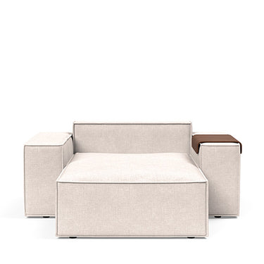 Comfortable Scandinavian lounger chair with wide arms, washable cover, and storage in 255 Adario Basmati