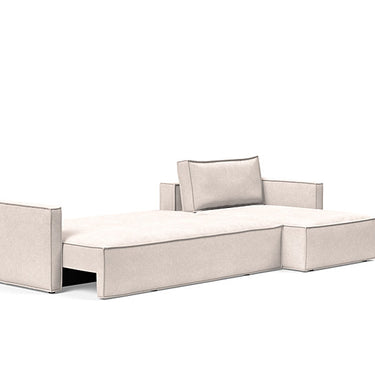 Modern Newilla Sleeper Sofa With Lounger in Adario Basmati 255 showing reversible chaise, slim arms, and soft pocket-spring comfort system.