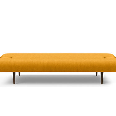 Yellow bench with wooden legs on a white background