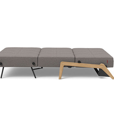 Cubed Full Size Sleeper Sofa in Mixed Dance Grey fabric with wood legs shown converting into a full bed for guest rooms
