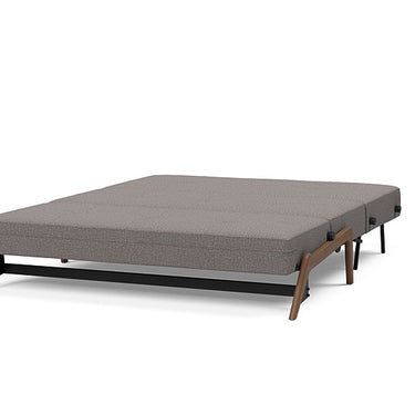 Cubed queen sofa bed in 521 Mixed Dance Grey fabric showing Scandinavian design and dark oak legs by Innovation Living