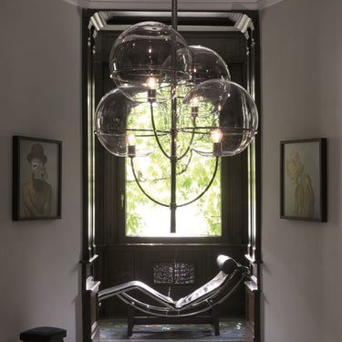 Lyndon pendant light by Oluce in an entryway, lifestyle view