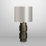 Ring table lamp in bronze with satin brass details and a dove grey silk shade, studio view
