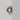 Pendulum wall light in bronze with a smoked glass shade, studio view