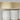 Row of white alabaster cylinders under a satin brass band on an Avalon chandelier