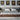 Nova Domus Janice Grey Fabric & Walnut Bed & Nightstands