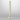 Artes floor lamp in satin brass with a column of honed alabaster on a round brass base, studio view