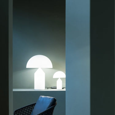 Modern Italian Atollo Opal LED table lamp designed by Vico Magistretti for bedside use