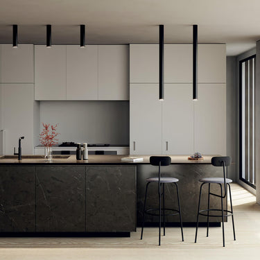 A-Tube modern LED ceiling light by Lodes in matte black installed in modern kitchen island
