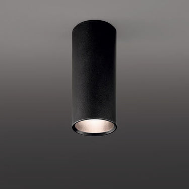 Modern tubular LED ceiling light A-Tube by Lodes featured in designer kitchen interior in matte black finish