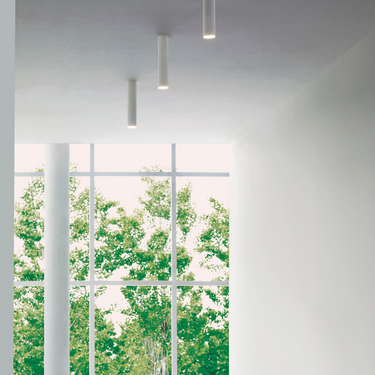 A-Tube matte white LED ceiling light mounted in minimalist modern living room