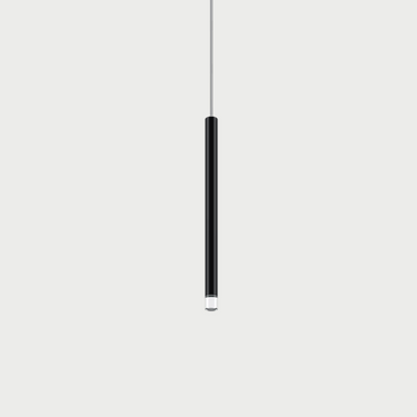 Lodes A-Tube Nano contemporary suspension lamp with integrated LED, featuring the elegant matte black finish and transparent diffuser, perfect for bedside lighting.