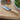 Large paring knife beside bowls of herbs and spices