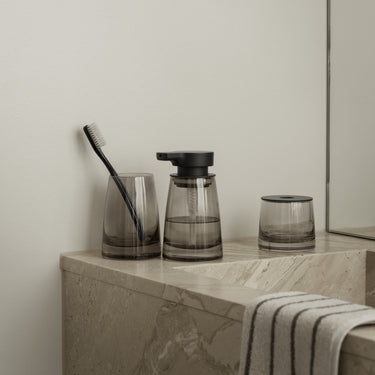 AVA soap dispenser in a styled bathroom (1) | AVA by Nadine Kümmel for blomus