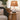 Ivory glazed ceramic table lamp with rechargeable lighting and neutral fabric shade