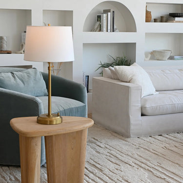 Alexis Cordless Table Lamp Brass with Linen Shade in a contemporary bedroom