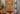 Alexis Cordless Table Lamp's antique brass base and rattan shade