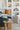 Alexis Cordless Table Lamp illuminating a modern living room setting