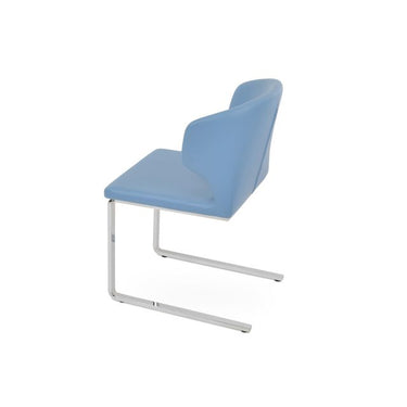 Modern upholstered dining chair by Soho Concept with chrome base and blue leatherette seat