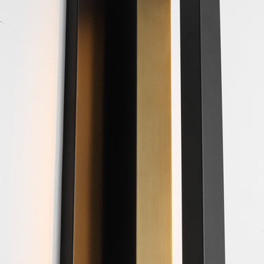 Anton X-Large brass-blade outdoor sconce welcoming guests at the door