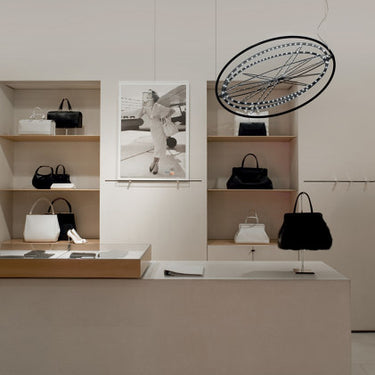 Artemide Copernico Pendant Light in Modern Living Room 