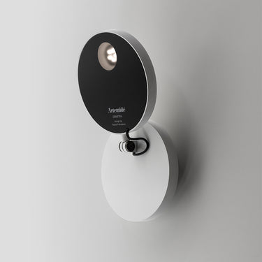 Italian-designed Artemide Demetra dimmable LED wall light for home offices and living spaces
