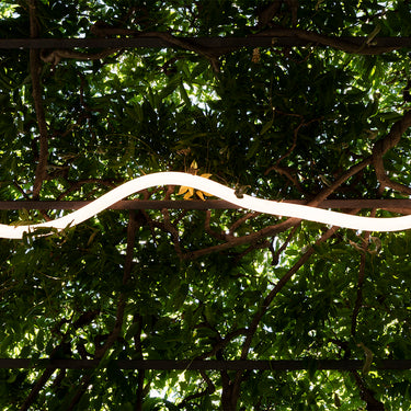 Flexible LED outdoor wall light by Bjarke Ingels Group, perfect for residential and commercial applications
