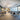 Ripple Cluster white LED suspension light installed in hotel lobby setting