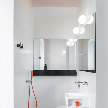 Artemide Dioscuri white globe light with handblown glass diffuser