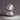 Eclisse Lamp Illuminating a Bookshelf