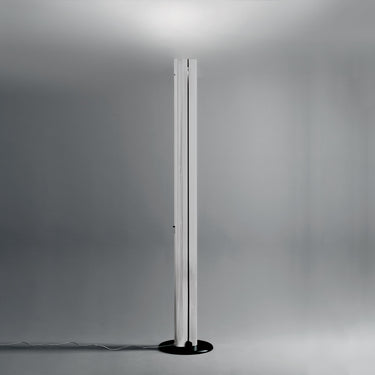 White Artemide Megaron Floor Lamp in Bedroom Setting