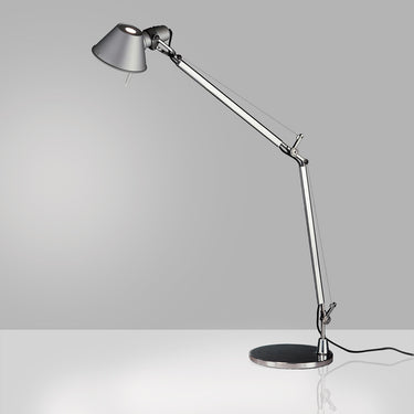 Classic Italian LED table lamp by Artemide, ideal for residential and commercial spaces.