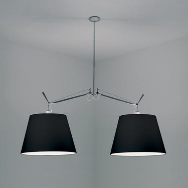 Adjustable Artemide Tolomeo Double Black pendant over luxury kitchen island for modern task lighting