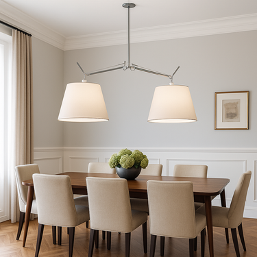 Tolomeo double parchment shade suspension lamp with adjustable arms over dining table in modern classic room