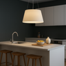 Tolomega Pendant Light by Artemide installed in a Kitchen Island