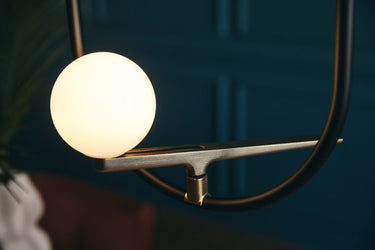 Artistic Artemide Yanzi brass swallow LED hanging lamp with dimming for contemporary entryways