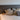 Artemide Demetra Wall Spot illuminating artwork in a hallway